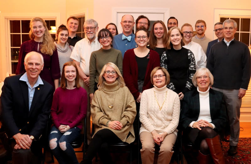 Attendees at the Phi Alpha Theta/History Department French Christmas Dinner on December 7, 2019, join for a photo at the outset of the evening. They are: (kneeling or seated, left to right) Dr. Stephen Carls, Savannah Wright, Brenda Briley, Becky Lindley, and Nancy Thomas; (standing, left to right) Camille Wehrman, Alex Anderson, Nathan Van Neste, Dr. Terry Lindley, Lillie Salazar, Sandra Allen, Robert Briley, Katie Allison, Christopher Hearn (standing behind Katie Allison), Emma Otto, Nicholas Terra, Megan Ledbetter, Nathan Heatherly, Luke Sower, Dr. Keith Bates, and Dr. David Thomas.