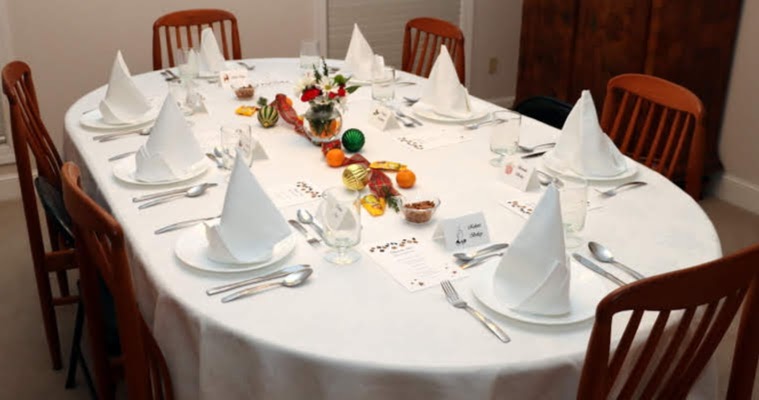 A festively decorated table is ready for use at the Phi Alpha Theta/History Department French Christmas Dinner on December 7, 2019.