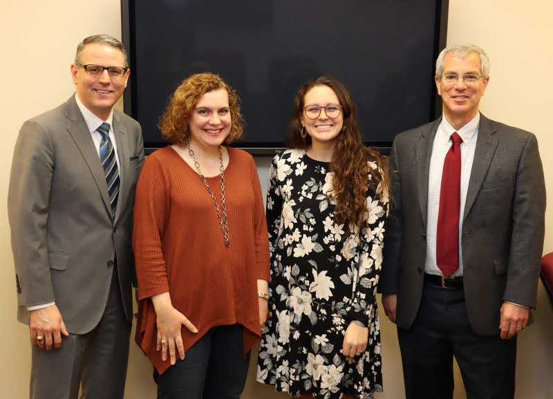 Katie Allison (second from right) stands with members of her history honors thesis committee following her successful defense on December 9, 2019. Committee members are (left to right) Dr. Keith Bates, Dr. Janna Chance, and thesis committee chair Dr. David Thomas