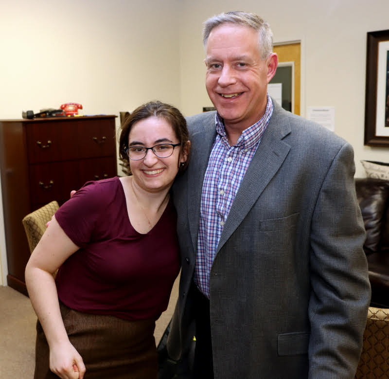 Dr. Henry Allen congratulates Leah Atkins on her successful honors thesis defense on December 9, 2019.