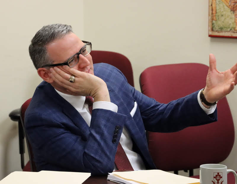 Thesis committee member Dr. Keith Bates asks a question during Luke Sower's thesis defense on December 3, 2019.