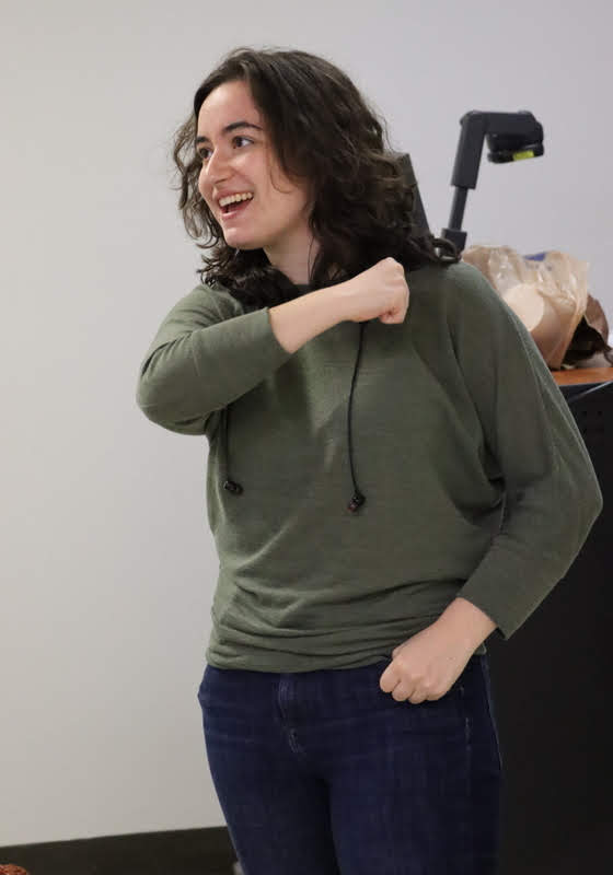 Rutledge Honorary History Club President Leah Atkins displays excitement at the group's fall plenary meeting on November 11, 2019, after the  club decided to have its fall pizza party/movie night on November 21.