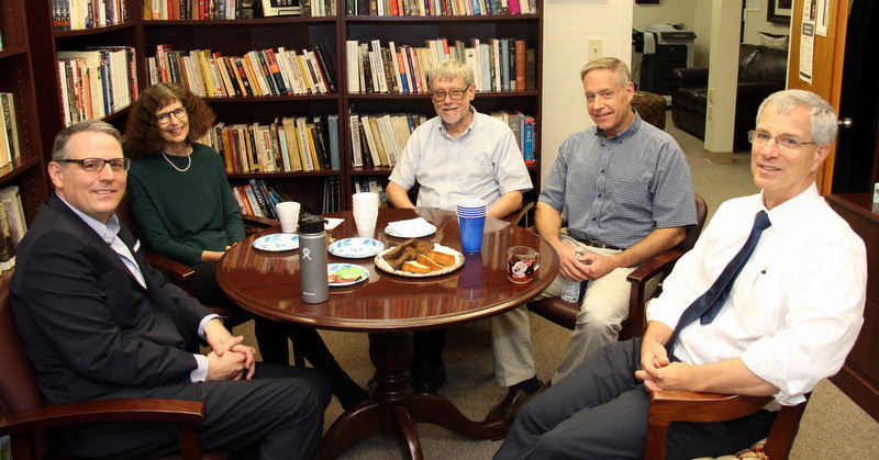 Dr. Joan Waugh of UCLA has coffee and pastries with history department members on the afternoon of October 21, 2019. Department members in the photo are (left to right) Drs. Keith Bates, Terry Lindley, Henry Allen, and David Thomas.
