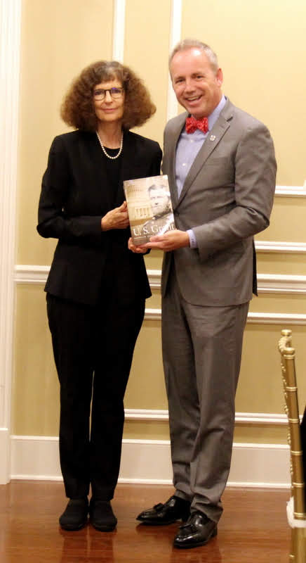 Professor Joan Waugh of UCLA gives a copy of her book U. S. GRANT: AMERICAN HERO, AMERICAN MYTH to Union University President Dr. Samuel W. Dub Oliver at a dinner in her honor on October 21, 2019.
