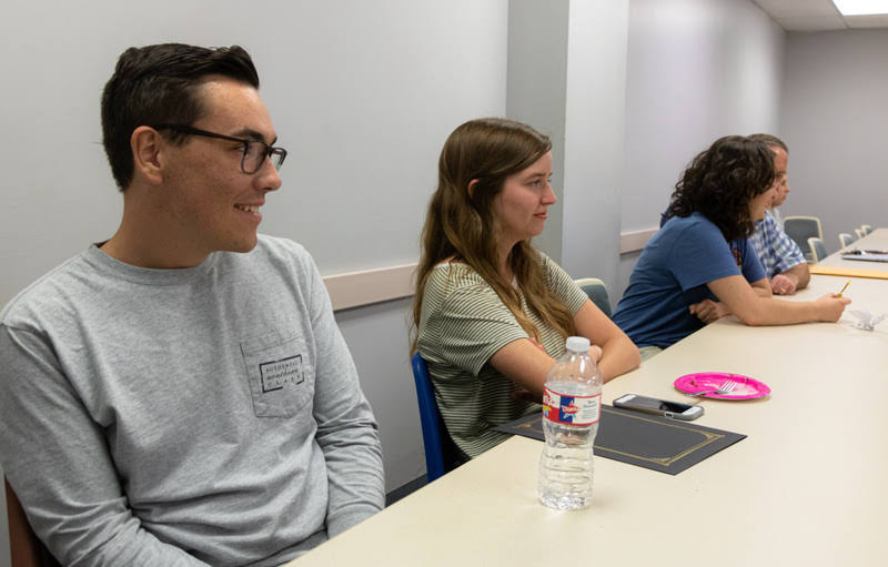 Phi Alpha Theta members Mac Hazlerig and Rebekah Lisle follow the proceedings of the Delta-Psi chapter's plenary meeting on September 24, 2019. Photo by Joey Echeverria