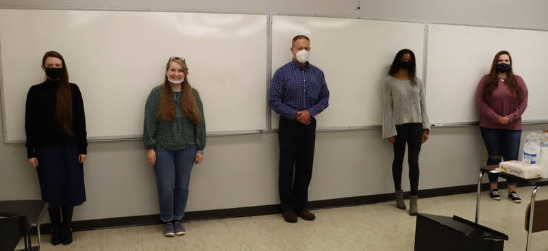 Attendees at the Rutledge Honorary History Club plenary meeting on October 26, 2020, stand together for a photo. They are (left to right) Davina Norris, Breanna Edmiston, Dr. Henry Allen, Hannah Hempel, and Sandra Allen.