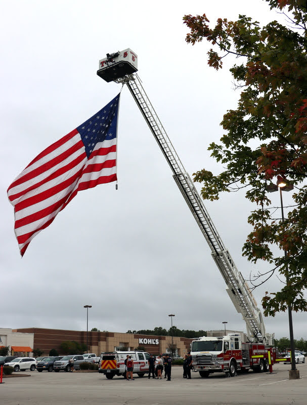 An American flag flies near the start and finish lines of the Racing So They Can Ride races on September 18, 2021.
