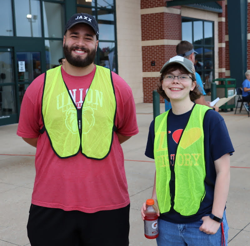Delta-Psi chapter members Nicholas Terra and Elizabeth Blevins pause for a photo prior to the Racing So They Can Ride races at Dick's Sporting Goods in Jackson on September 18, 2021.