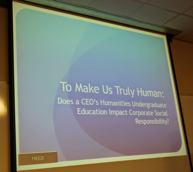 Caitlin Roach announces the title of her paper on a screen at the Union University Scholarship Symposium on April 28, 2015.