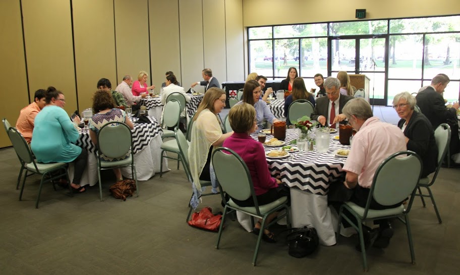 Attendees enjoy dinner and conversation together at the Department of History Awards Banquet in Union's Coburn Dining Room on April 30, 2015.