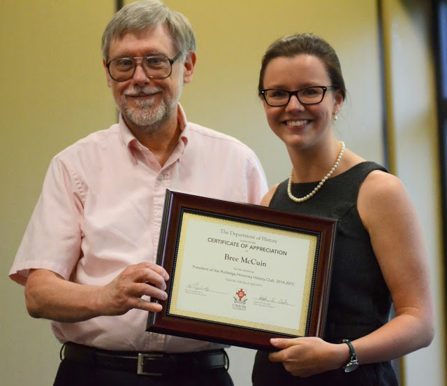 Dr. Terry Lindley presents a certificate of appreciation to Bree McCuin at the history awards banquet on April 30, 2015, for her service as the Rutledge Honorary History Club president in 2014-2015.  Photo by Emily Stookey