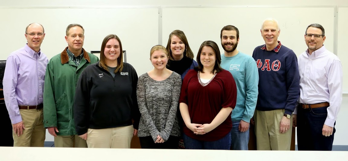 History department faculty and Phi Alpha Theta chapter officers for 2014-2015 stand together at the Delta-Psi chapter's spring initiation and plenary meeting on February 24, 2015.