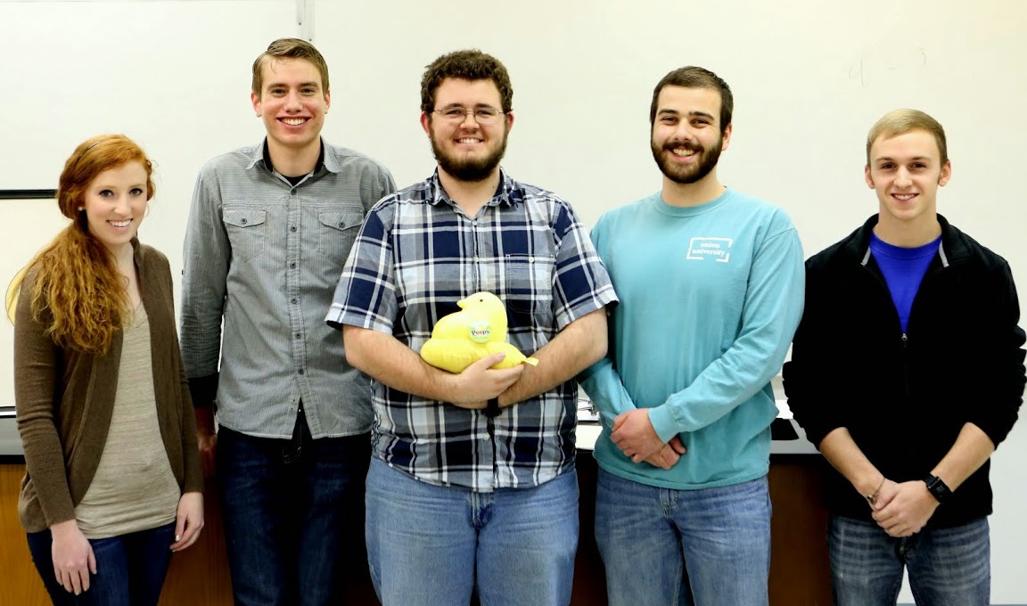 The Delta-Psi chapter's newly elected officers for 2015-2016 stand together for a photo at the society's meeting on February 24, 2015.