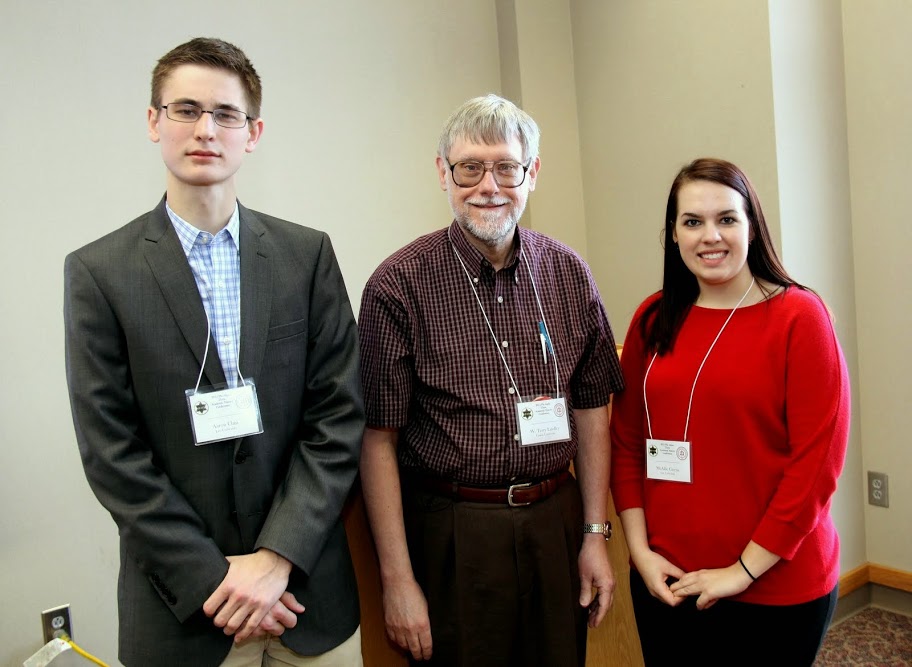 Dr. Terry Lindley (center) stands with the paper presenters for the panel on Fear Driving Politics at the Tennessee Phi Alpha Theta Regional Conference at Austin Peay State University on February 28, 2015. The presenters are Aaron Chin of Lee University and McAllie Givens of Lee University.