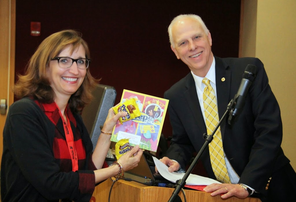 Phi Alpha Theta Conference co-chair Dr. Minoa Uffelman and National Phi Alpha Theta President Dr. Stephen Carls smile for the camera on February 28, 2015, after Carls presented Uffelman with a Peeps recipe book and chocolate-covered Peeps during a thank you presentation.