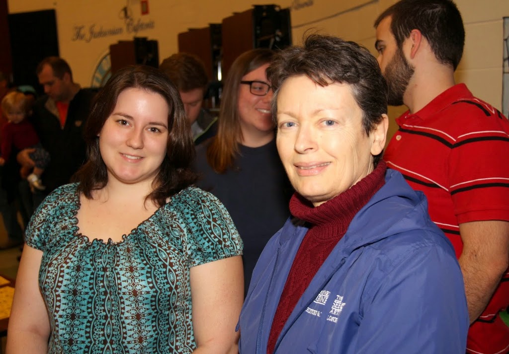 Delta-Psi Chapter President Faith Bagley (left) and Dr. Alice-Catherine Carls stand in line at the Jackson Old Hickory Rotary Club Pancake Breakfast on March 14, 2015.