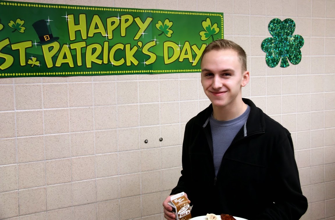 Devin Dean smiles as he finishes going through the serving line at the Old Hickory Rotary Club's pancake breakfast at Andrew Jackson Elementary School on March 14, 2015.