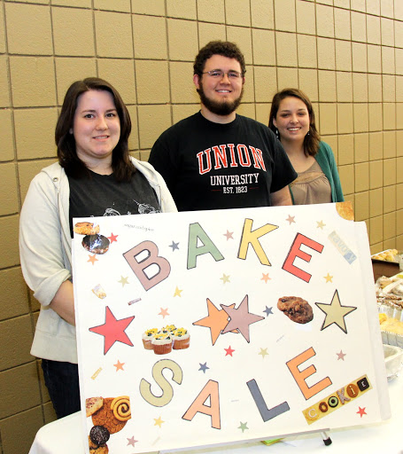 Phi Alpha Theta student members (left to right) Faith Bagley, Nick Hancock, and Emily Littleton pause for a photo during the 12th Annual Franco-American Confection and Bake Sale on March 18, 2015.