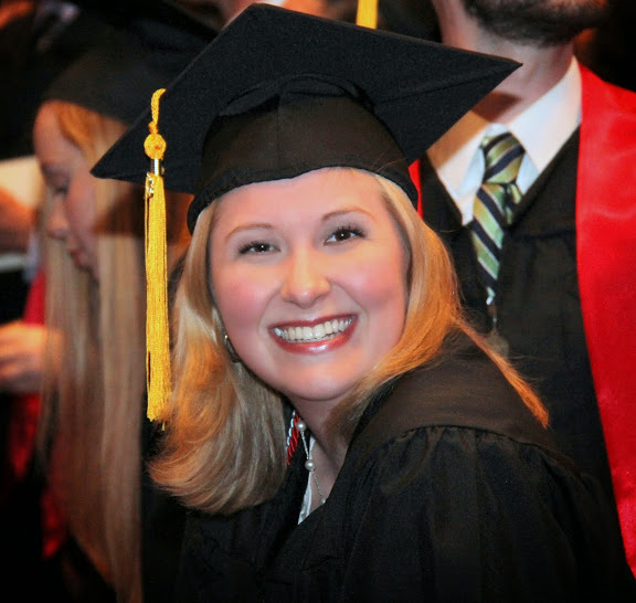 Phi Alpha Theta member Hannah Jones smiles from her seat at Union University's spring graduation on May 16, 2015.