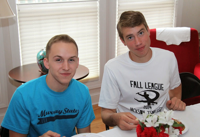 Phi Alpha Theta members Devin Dean (left) and Stephen Lewoczko relax at the 23rd Annual Phi Alpha Theta/History Department Cookout at Dr. Stephen Carls's home on May 8, 2015.