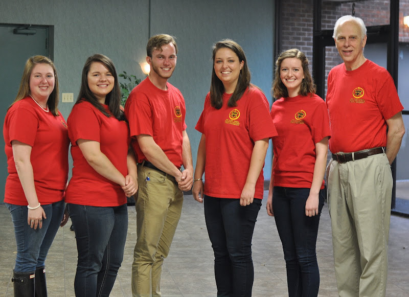The 2016-2017 Delta-Psi officers stand together during the chapter's Annual Red T-shirt Spirit Day on April 11, 2016. They are (left to right) Kathryn Mitchell (vice president), Jordan Sellers (president), Seth Reid (secretary), Emily Littleton (senator), Elizabeth Adams (senator), and Dr. Stephen Carls (faculty advisor). Photo by MiKalla Cotton
