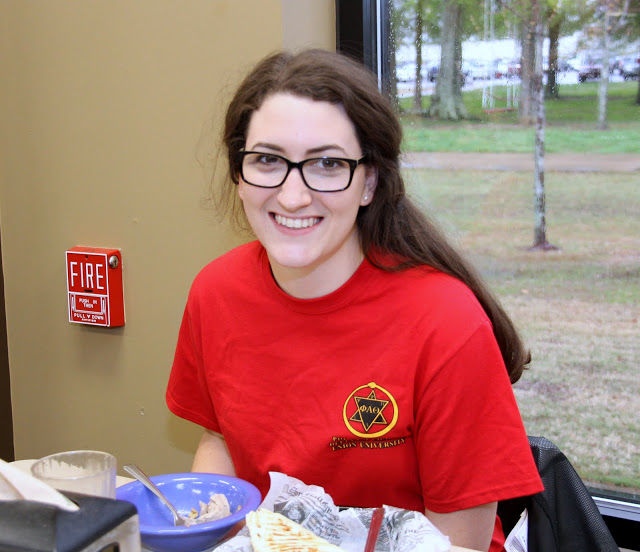Phi Alpha Theta member Olivia Winters wears her Delta-Psi chapter T-shirt at lunch on April 11, 2016.