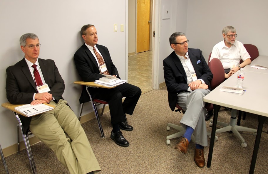Union University history department faculty members listen to Delta-Psi chapter member Jordan Sellers present her paper on Irish immigration in nineteenth-century New York at the Phi Alpha Theta regional conference on April 2, 2016. They are (left to right) Dr. David Thomas, Dr. Henry Allen, Dr. Keith Bates, and Dr. Terry Lindley.