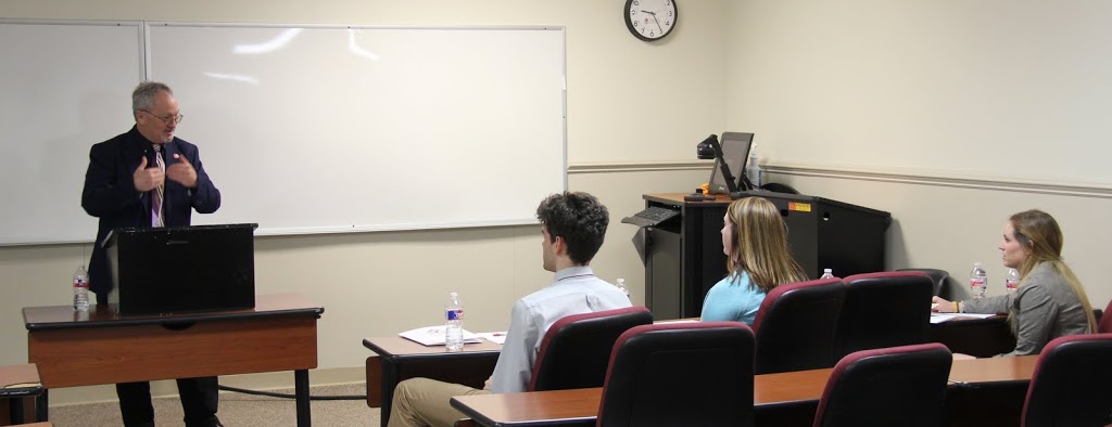 Dr. Michael Birdwell (standing) of Tennessee Technological University discusses student papers at a panel entitled Tennessee History at the Phi Alpha Theta regional conference on April 2, 2016.