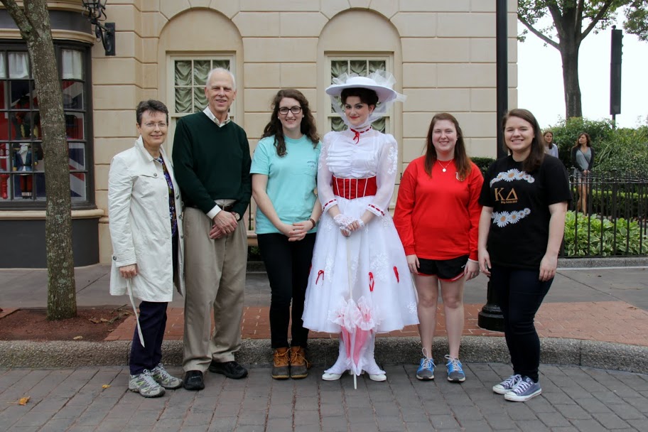 The Union contingent at the Phi Alpha Theta convention in Orlando, Florida, stand with Mary Poppins (dressed in white dress) at the Walt Disney World Epcot Theme Park on July 9, 2016. They are (left to right) Dr. Alice-Catherine Carls, Dr. Stephen Carls, Olivia Winters, Kathryn Mitchell, and Jordan Sellers.