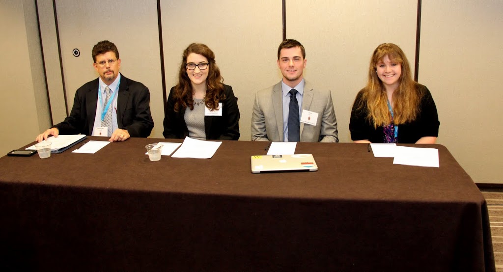 Participants in the 2016 Phi Alpha Theta convention panel Medicine/Public Health pause for a photo at the beginning of their session on January 7. They are (left to right) Dr. Christopher Kennedy, Olivia Winters, Ryan Johnson, and Kirsten Baker.