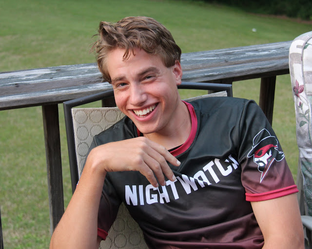 Phi Alpha Theta member Stephen Lewoczko relaxes at the Delta-Psi chapter's annual cookout on May 13, 2016.