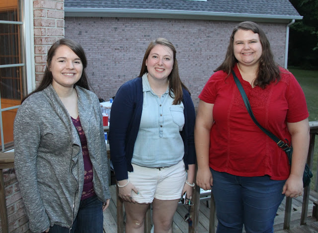 Jordan Sellers (left to right), Kathryn Mitchell, and Jessica Barton stand together at the history department cookout on May 13, 2016.