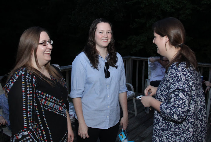 Hannah Conway (left to right), Lauren Geary, and Emily Littleton enjoy some conversation together at the end of the Phi Alpha Theta cookout on May 13, 2016.
