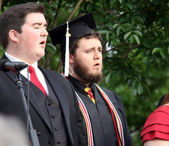 Graduating history major Nicholas Hancock (wearing the mortar board) sings with the Union University musical group Proclamation at Union University's commencement services on May 21, 2016.