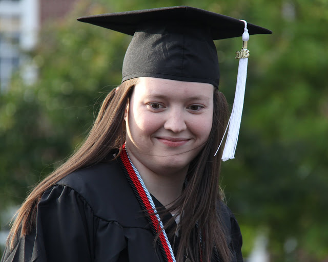 Lauren Geary gets ready to sit down after receiving her bachelor's degree on May 21, 2016.