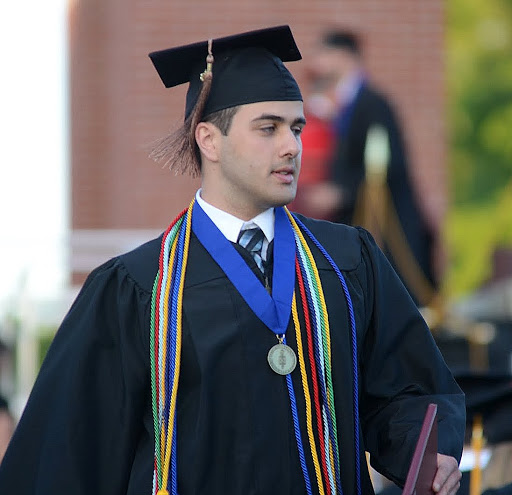 Allen Bradley returns to his seat after receiving his diploma at Union University's graduation exercises on May 21, 2016.
