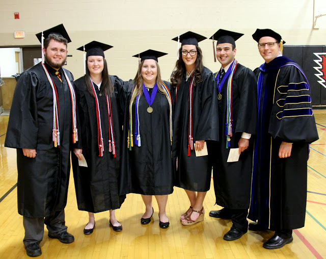 Dr. Keith Bates (right) stands with graduating Phi Alpha Theta members prior to Union University's commencement services on May 21, 2016. The students are (left to right) Nicholas Hancock, Lauren Geary, Hannah Conway, Olivia Winters, and Allen Bradley.
