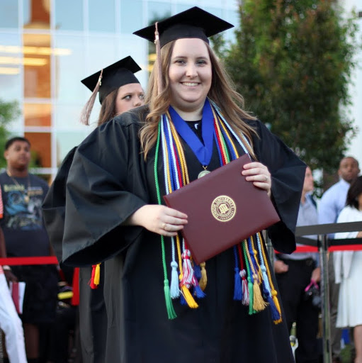 Hannah Conway shows delight after receiving her bachelor's degree at Union University's commencement exercises on May 21, 2016.