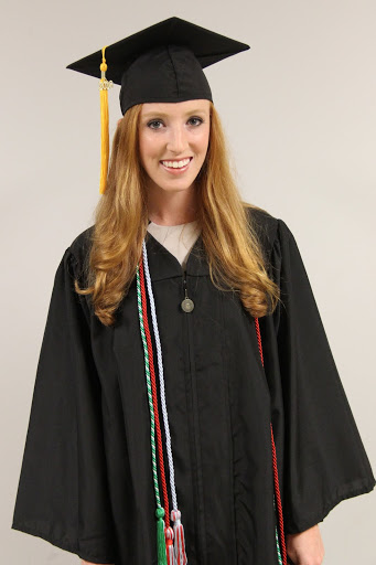 Phi Alpha Theta member Hollie Wilson waits for the graduation processional to begin at Union University's commencement services on May 21, 2016.