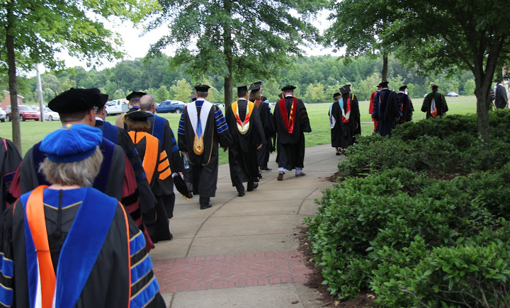 Faculty members and members of Union University's administration participate in the school's graduation processional on May 21, 2016.