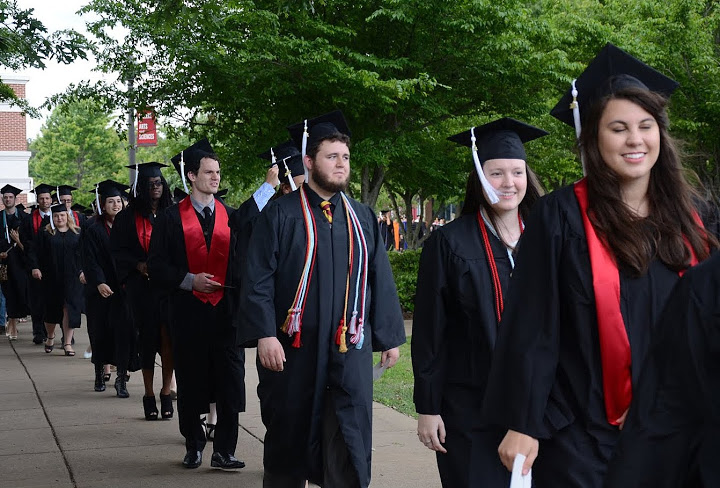 Lauren Geary (second from right) and Nicholas Hancock (third from right) participate in the processional at Union University's graduation exercises on May 21, 2016.