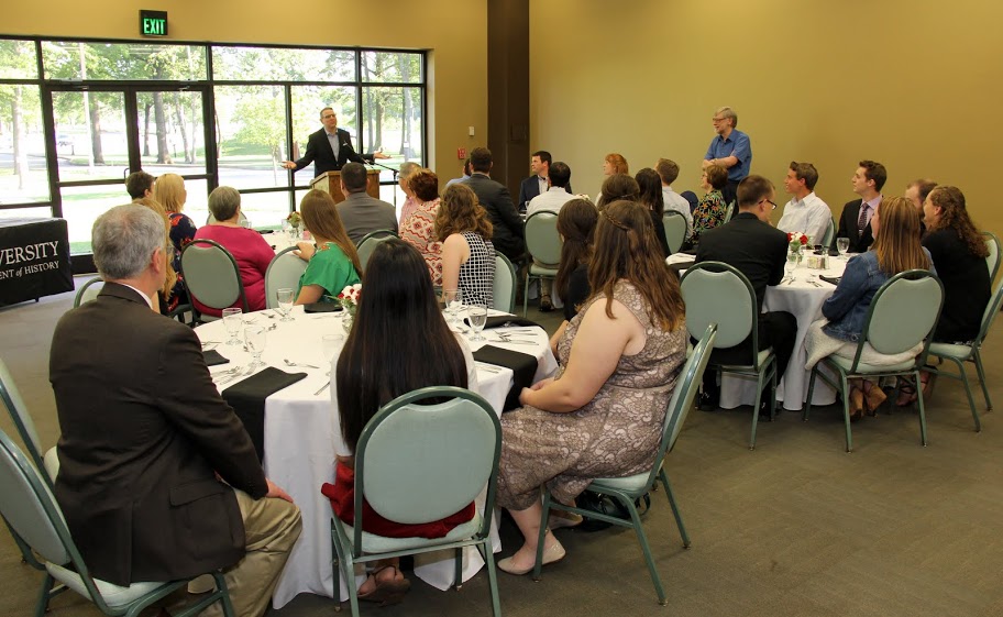 Dr. Keith Bates prepares to give the invocation at the History Department Awards Banquet on May 5, 2016.