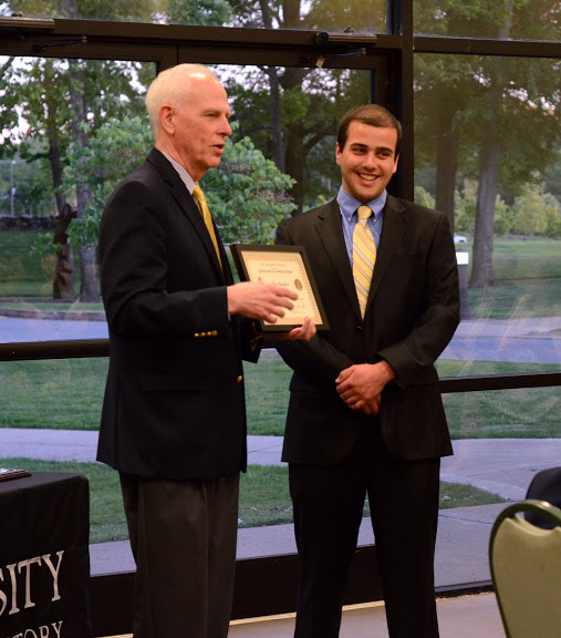 Dr. Stephen Carls presents a certificate of appreciation to Allen Bradley at the history awards banquet on May 5, 2016, for his work as the vice president of Union University's Delta-Psi chapter of Phi Alpha Theta in 2015-2016. Photo by MiKalla Cotton