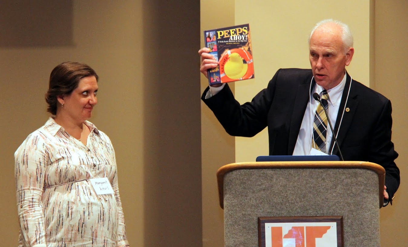 Dr. Stephen Carls presents a book titled PEEPS AHOY! to Dr. Margaret Lewis at the Phi Alpha Theta regional conference luncheon on April 1, 2017. Dr. Lewis served as the regional conference coordinator.