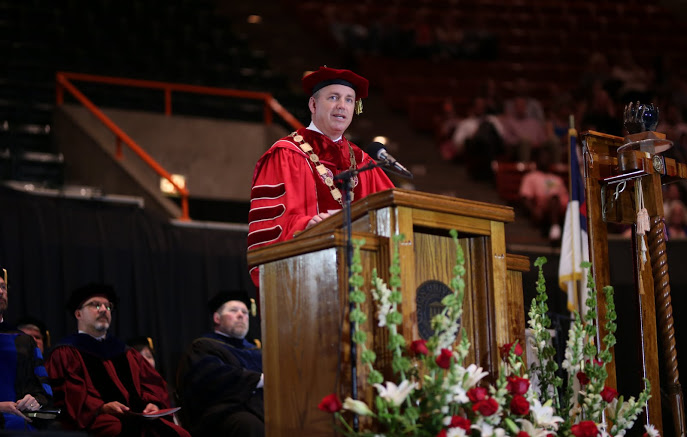 Dr. Samuel W. Dub Oliver, president of Union University, welcomes attendees to the undergraduate commencement exercises at Jackson's Oman Arena on May 20, 2017. Photo by Kristi Woody