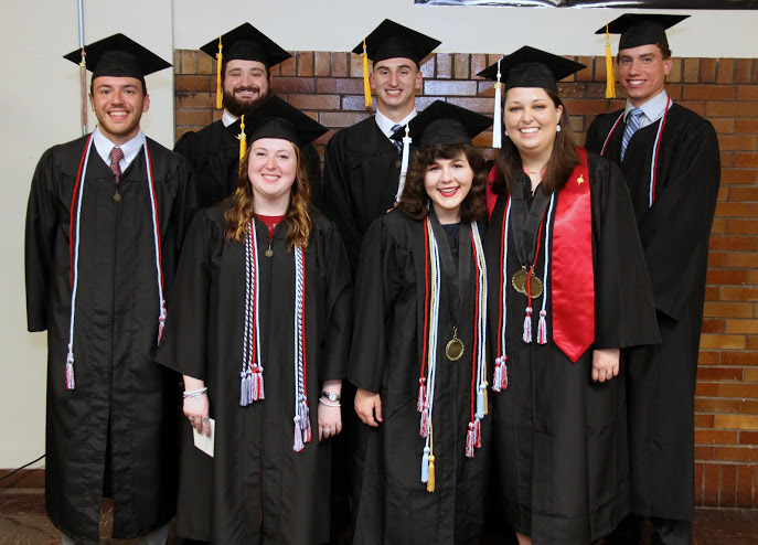 Graduating history majors and Phi Alpha Theta members pause for a photo prior to Union University's spring graduation on May 20, 2017. They are: (front row, left to right) Kathryn Mitchell, Priscilla Porter, and Emily Littleton; (back row, left to right) Jeremy Ebert, Luke Parrett, Jeff Williams, and Stephen Lewoczko.