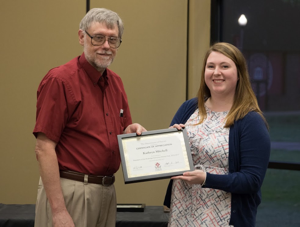 Kathryn Mitchell accepts a certificate of appreciation from Dr. Terry Lindley at the history awards banquet on May 4, 2017, for her work as president of the Rutledge Honorary History Club in 2016-2017. Photo by Janelle Vest