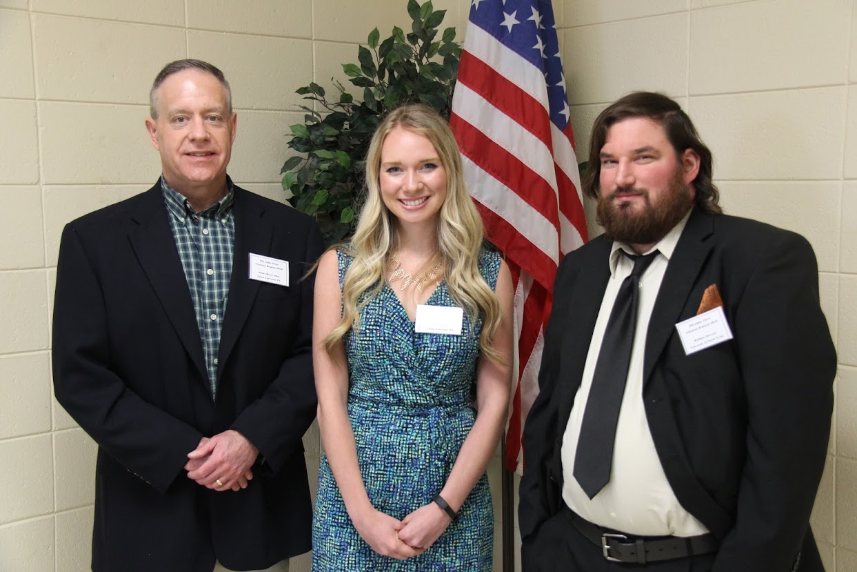 Members of the Phi Alpha Theta conference panel titled Race and the Construction of Community stand together at the beginning of their session. They are (left to right) panel chair Dr. Henry Allen and paper presenter Ali Renckens of Union University, and William Thweatt of the University of North Texas.
