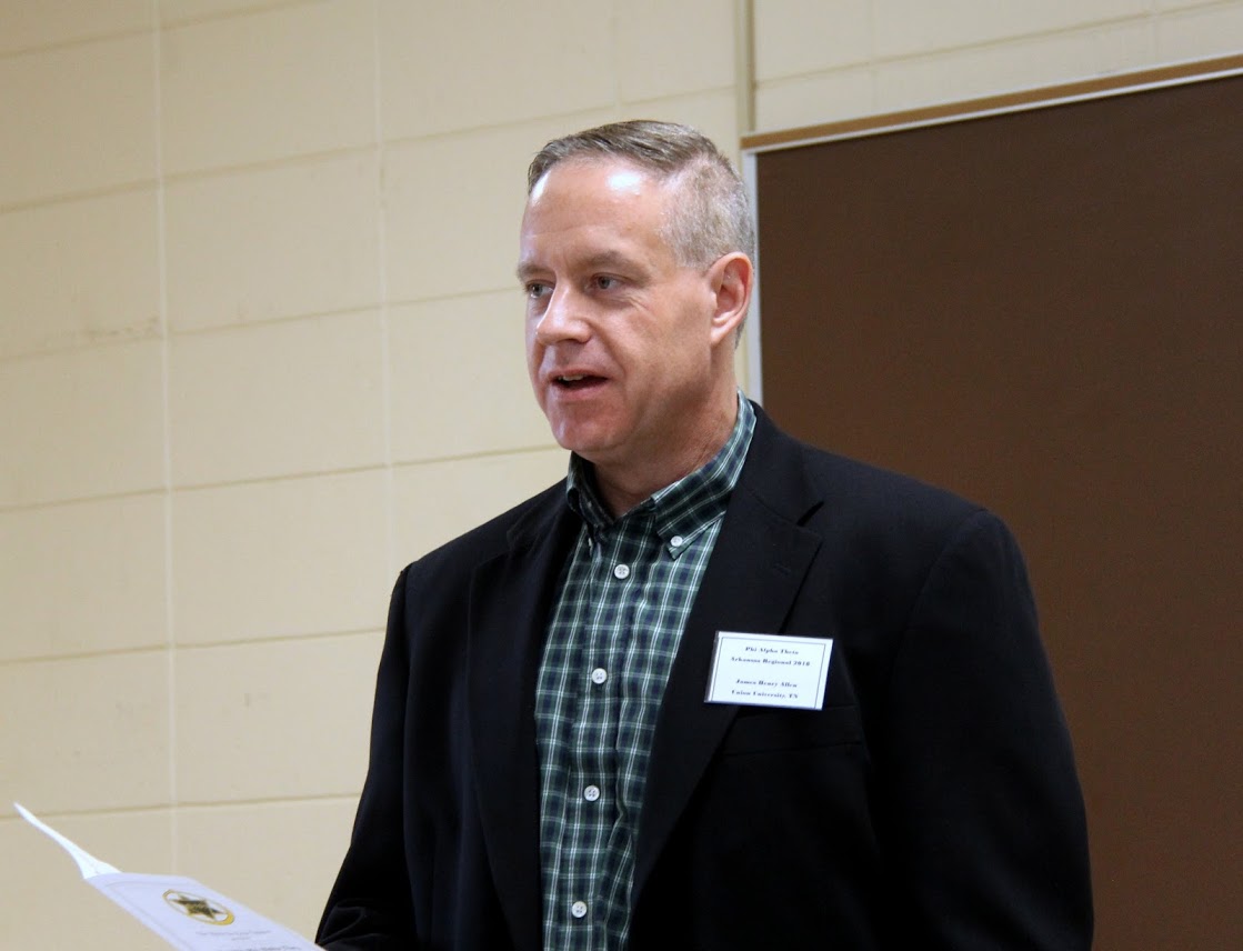 Dr. Henry Allen introduces the paper presenters at the Phi Alpha Theta conference panel on Race and the Construction of Community on April 7, 2018.
