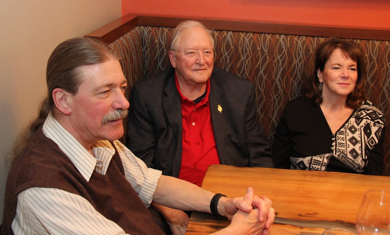 National Phi Alpha Theta Vice President Clayton Drees (left), Executive Director Graydon Tunstall, and Tunstall's wife Wendy enjoy the festive atmosphere at the dinner in honor of Dr. Tunstall on January 5, 2018, at the Trenasse Restaurant in New Orleans.